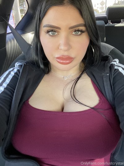 Busty Brunette Taking Slefie Into The Car