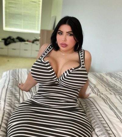 Beautiful PAWG in Striped Dress Sitting on Bed